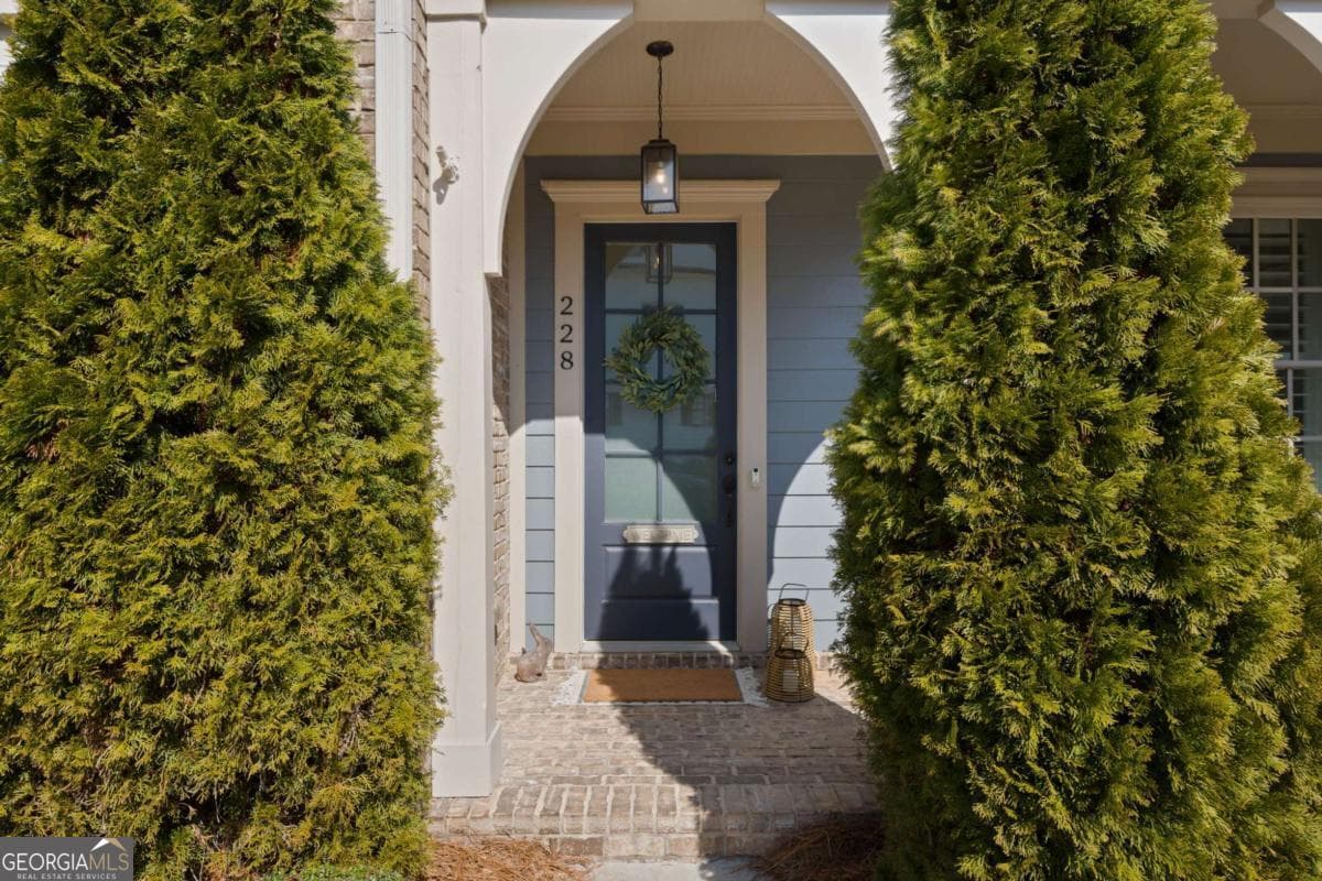 4 bedroom, 3.5 bathroom, 3,135 sq ft single family residence for sale at 228 Dawson Drive, Woodstock, GA 30188 — photo 2
