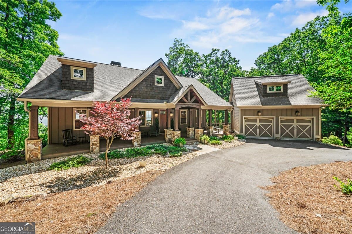 4 bedroom, 3.5 bathroom, 3,130 sq ft single family residence sold at 88 Sanderlin Mtn Drive, Big Canoe, GA 30143