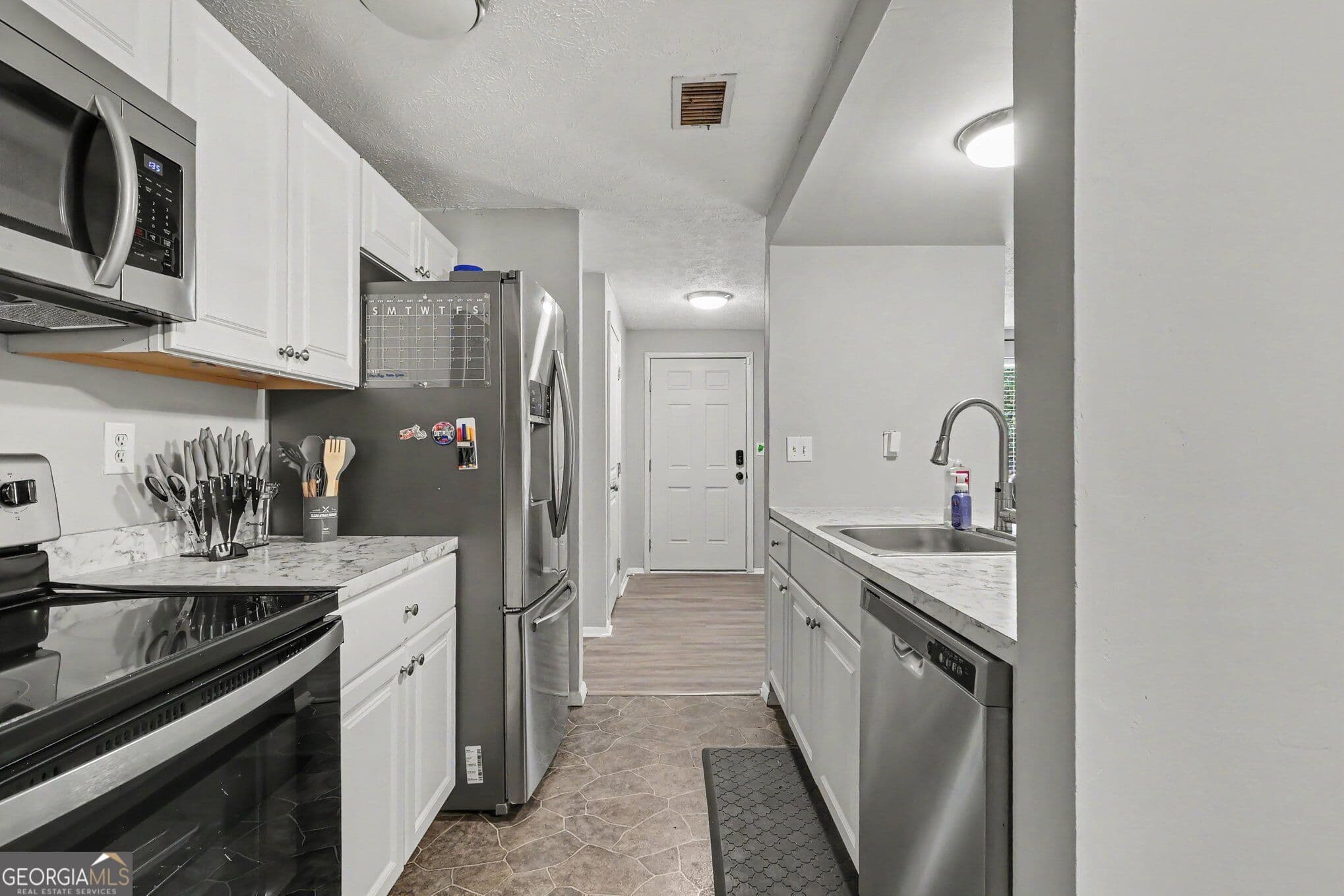 3 bedroom, 2 bathroom, 1,524 sq ft single family residence for sale at 3286 Tasman Court, Lithonia, GA 30038 — photo 10