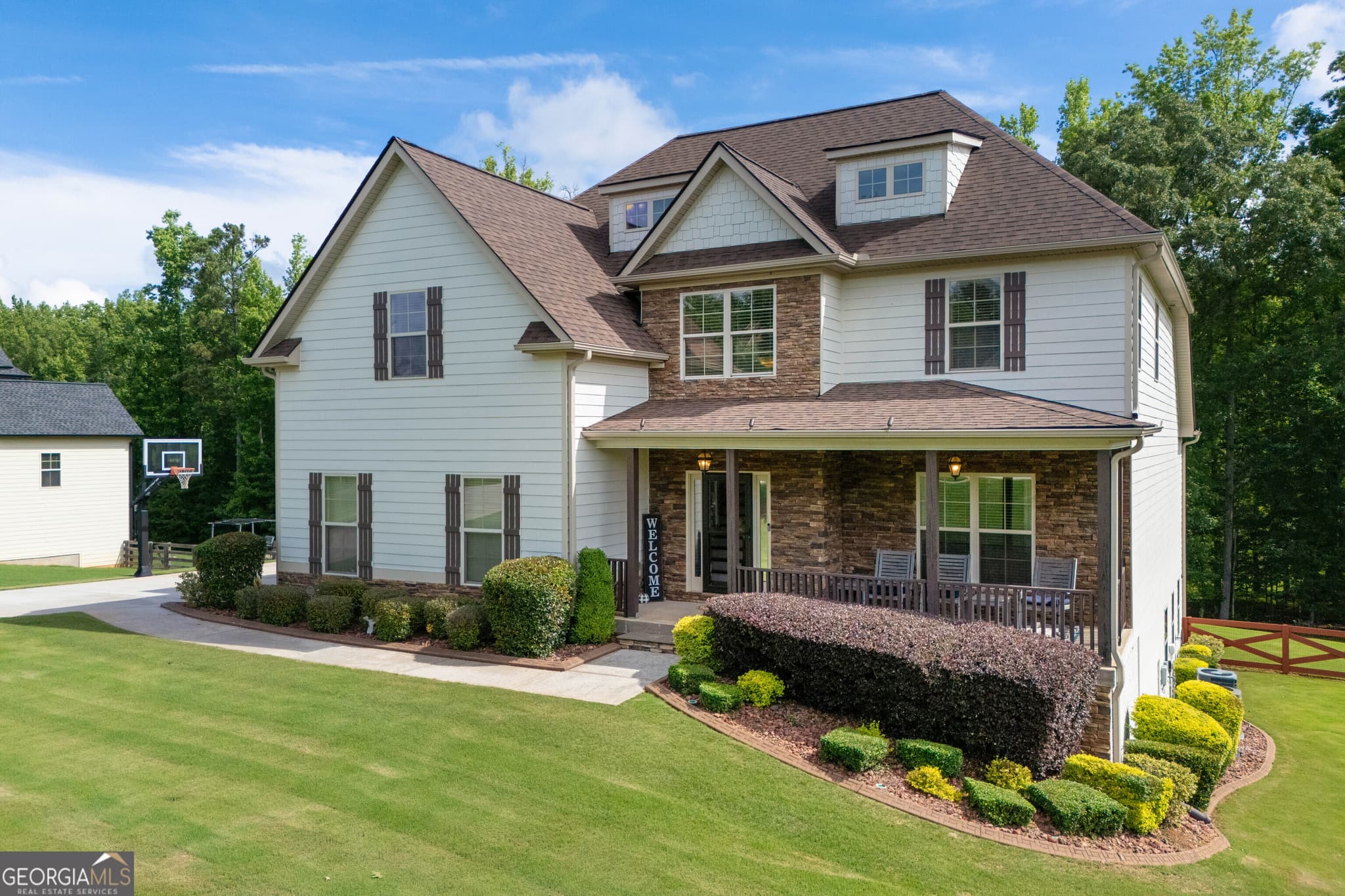 5 bedroom, 4.5 bathroom, 5,611 sq ft single family residence sold at 215 Northgate Preserve Drive, Newnan, GA 30265