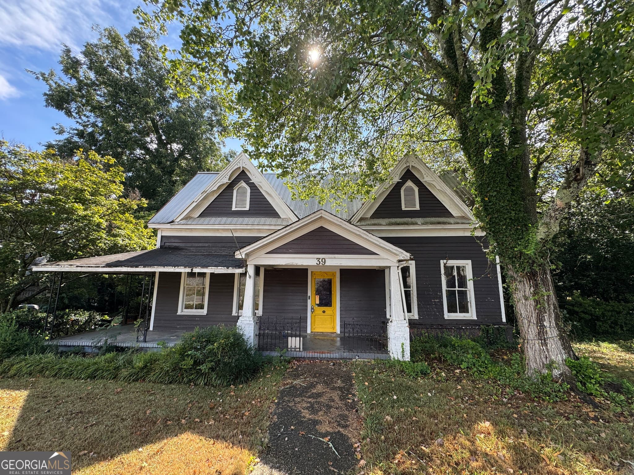 4 bedroom, 2 bathroom, 2,335 sq ft single family residence for sale at 39 W Main Street, Hampton, GA 30228 — photo 1 of 3