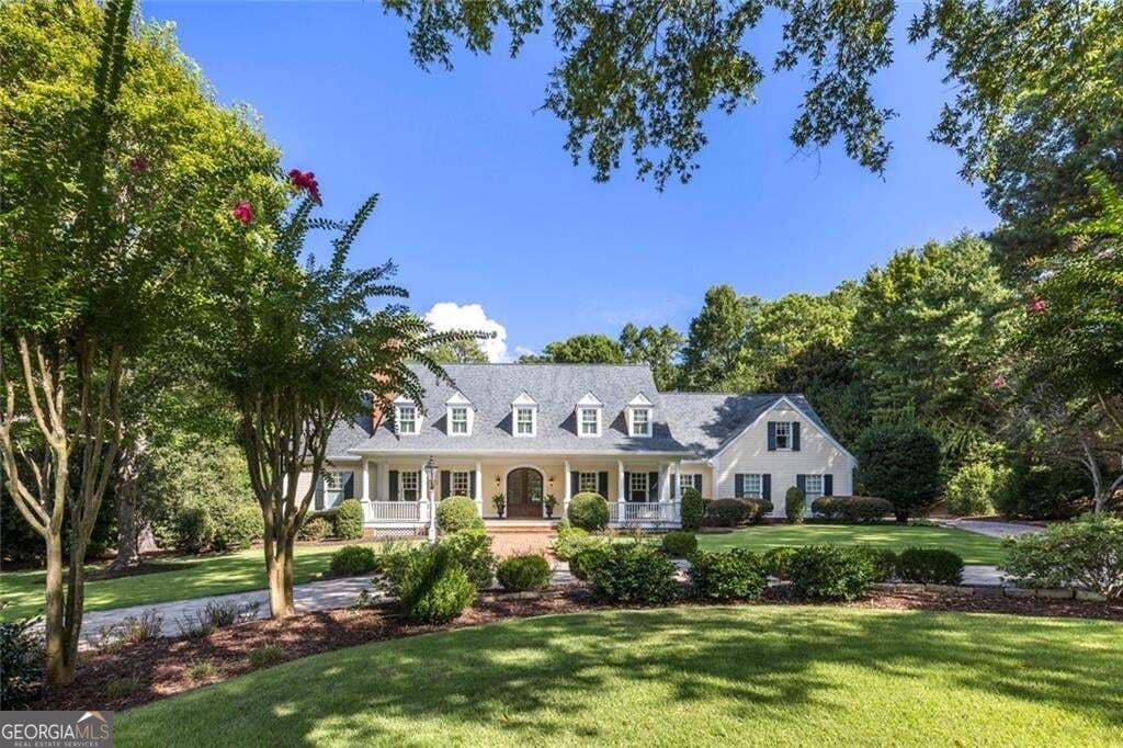 6 bedroom, 5 bathroom, 8,744 sq ft single family residence for sale at 575 Old Cobblestone Drive, Atlanta, GA 30350 — photo 2