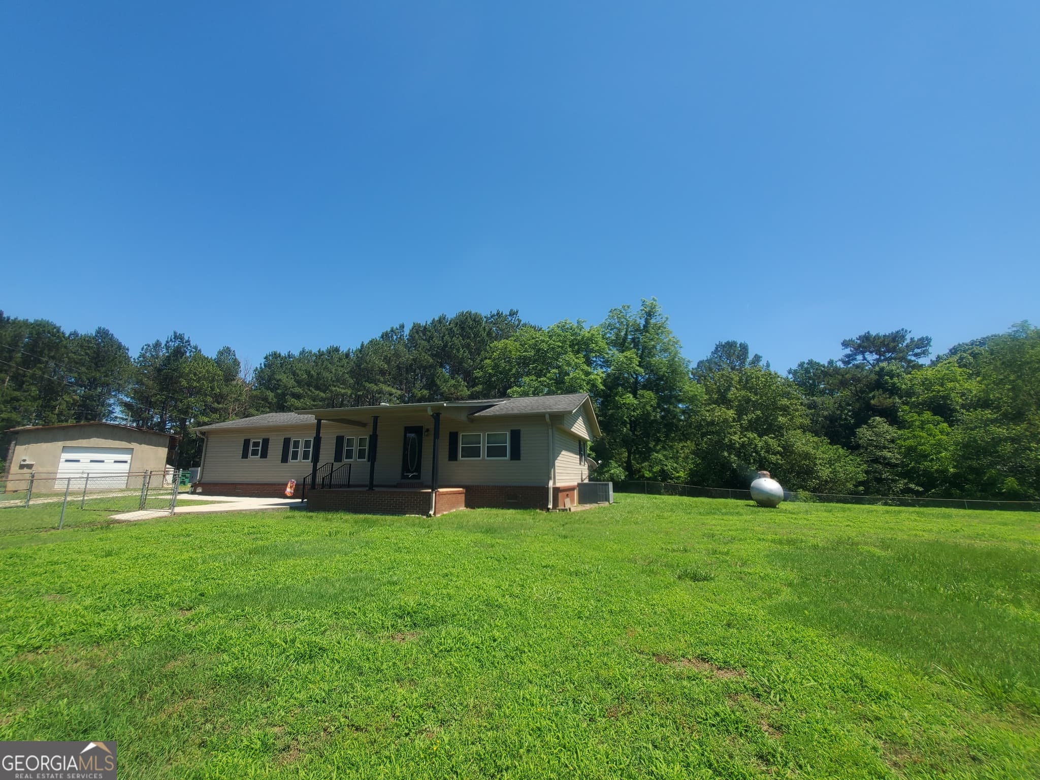 2 bedroom, 1 bathroom, 1,344 sq ft manufactured home,single family residence for sale at 2021 Red Hill Road, Carnesville, GA 30521 — photo 9