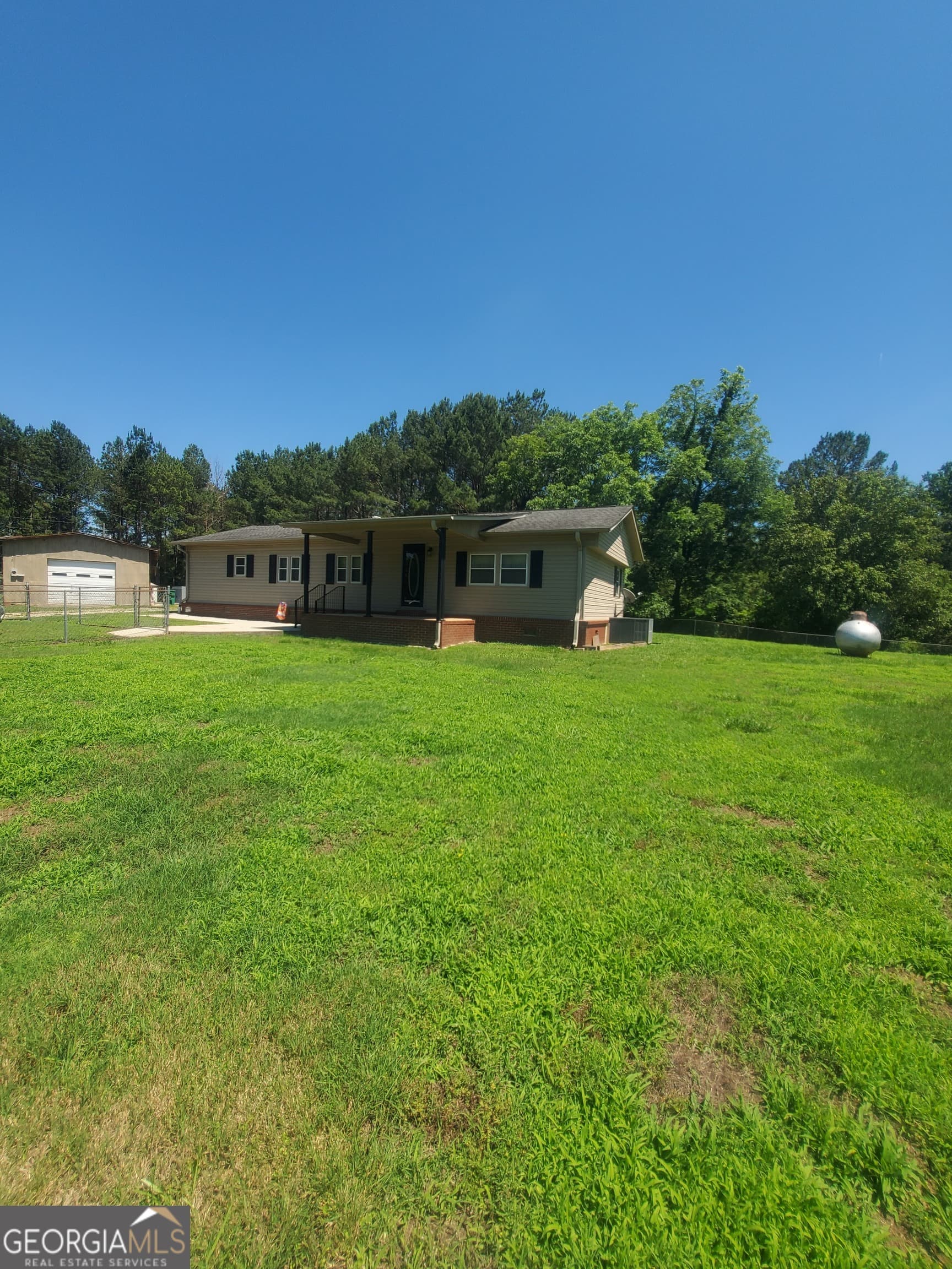 2 bedroom, 1 bathroom, 1,344 sq ft manufactured home,single family residence for sale at 2021 Red Hill Road, Carnesville, GA 30521 — photo 10