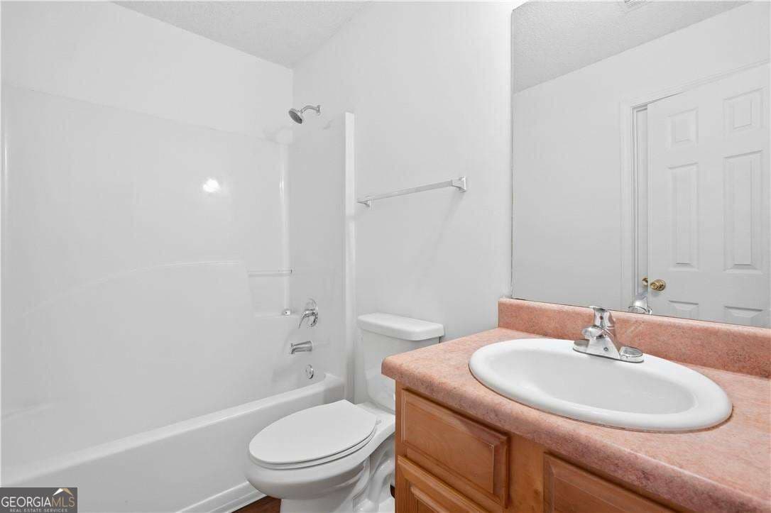 5 bedroom, 3 bathroom, 3,157 sq ft single family residence for sale at 645 Wildboar Court, Fairburn, GA 30213 — photo 6
