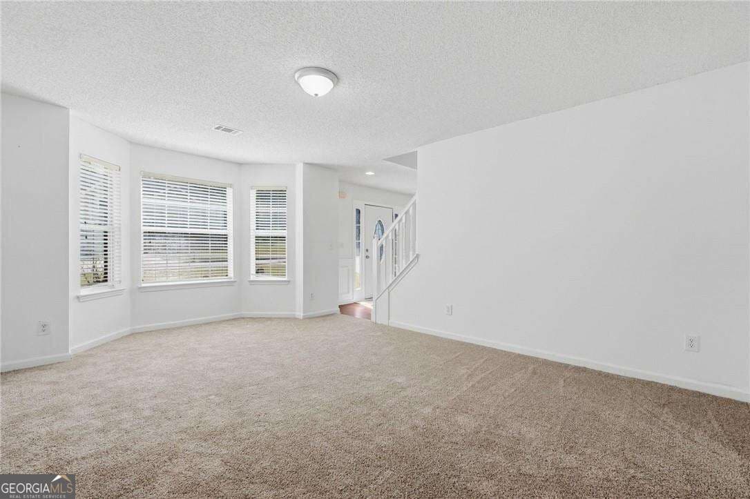 5 bedroom, 3 bathroom, 3,157 sq ft single family residence for sale at 645 Wildboar Court, Fairburn, GA 30213 — photo 7