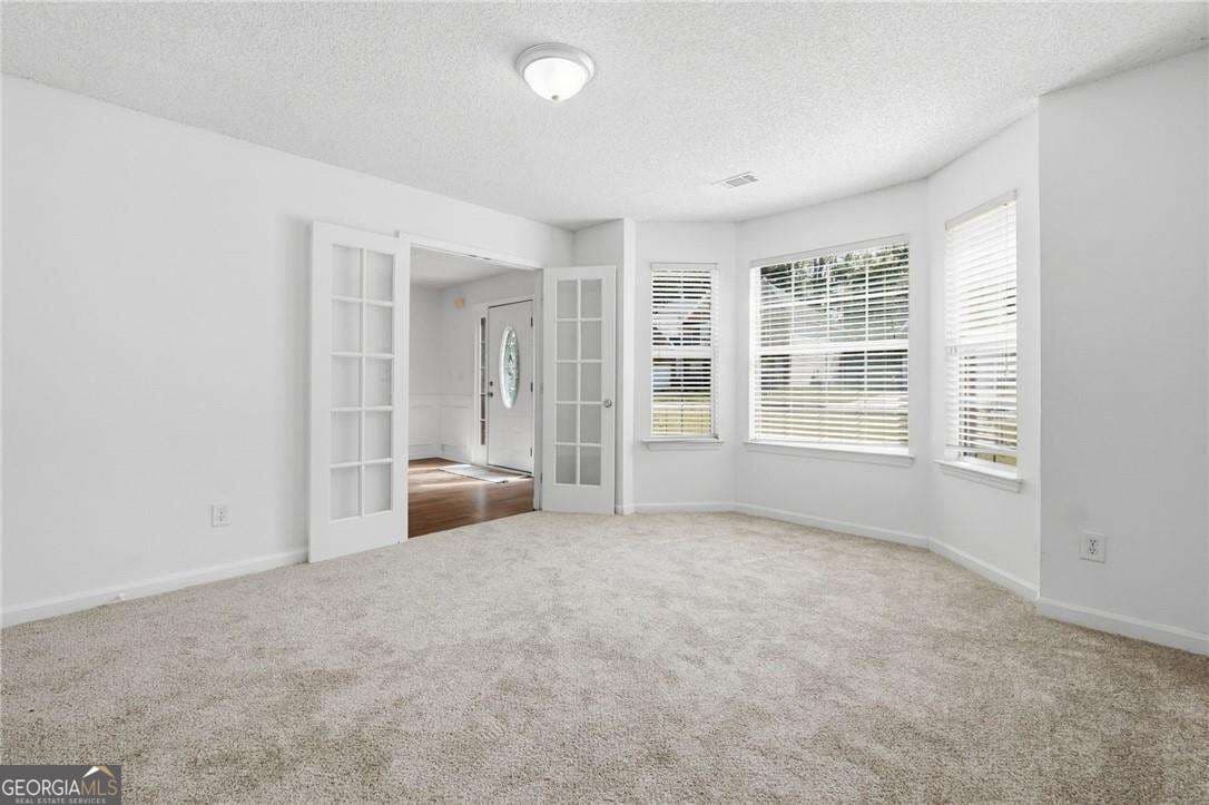 5 bedroom, 3 bathroom, 3,157 sq ft single family residence for sale at 645 Wildboar Court, Fairburn, GA 30213 — photo 3