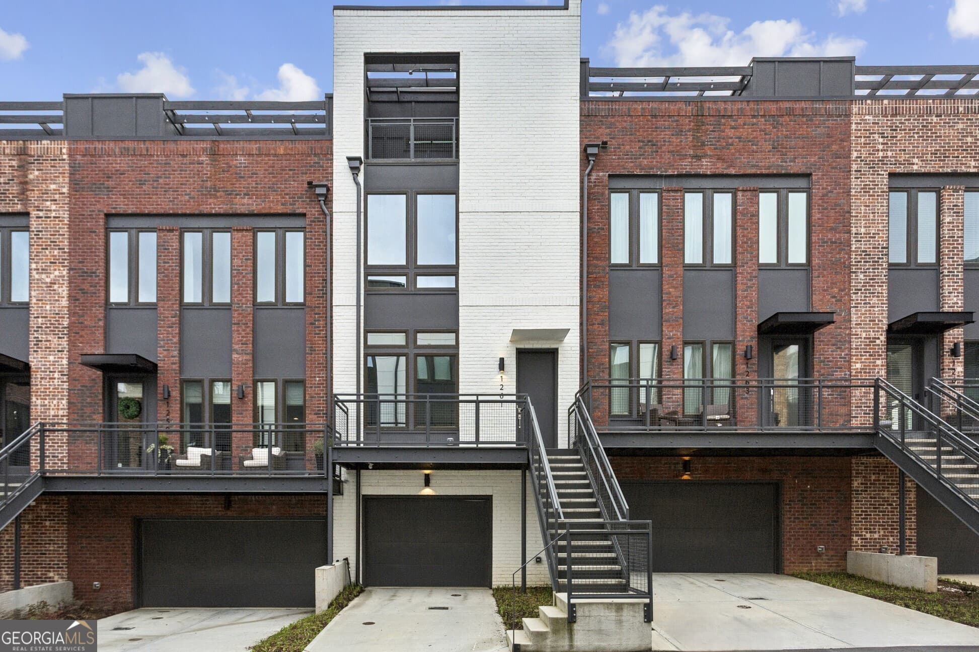 2 bedroom, 2.5 bathroom, 1,962 sq ft townhouse for sale at 1261 Chelsea Circle, Atlanta, GA 30318 — photo 1 of 46