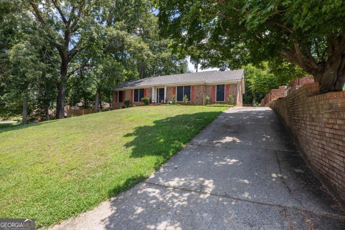 4 bedroom, 3 bathroom single family residence for sale at 5510 Sedgewick Drive, Columbus, GA 31904 — photo 2