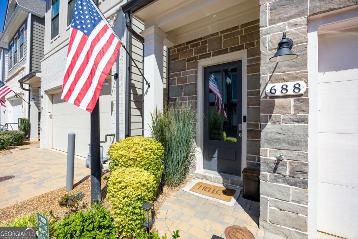 3 bedroom, 3.5 bathroom, 2,609 sq ft single family residence for sale at 688 Stickley Oak Way, Woodstock, GA 30189 — photo 2