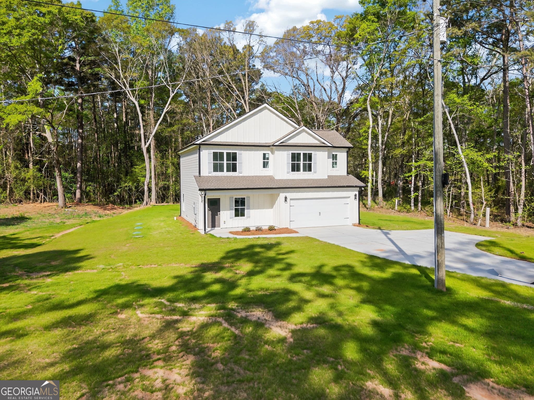 4 bedroom, 2.5 bathroom single family residence for sale at 1229 Chappel Mill Road, Jackson, GA 30233 — photo 3