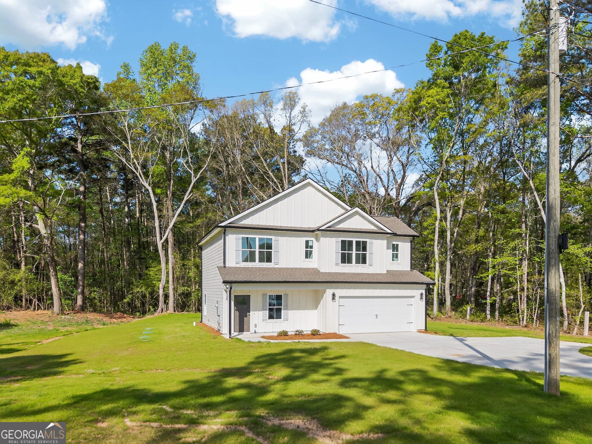 4 bedroom, 2.5 bathroom single family residence for sale at 1229 Chappel Mill Road, Jackson, GA 30233 — photo 4