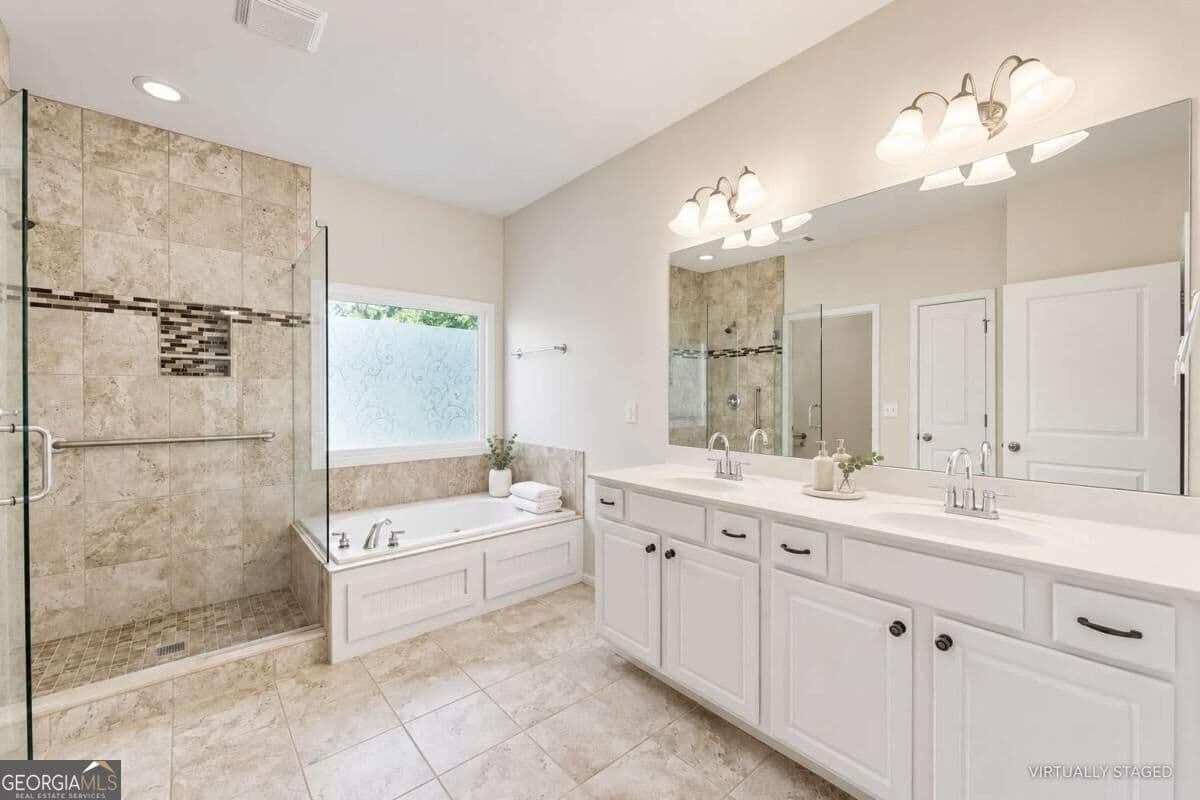 4 bedroom, 3.5 bathroom, 2,875 sq ft single family residence for sale at 3765 Baxley Lane, Suwanee, GA 30024 — photo 6