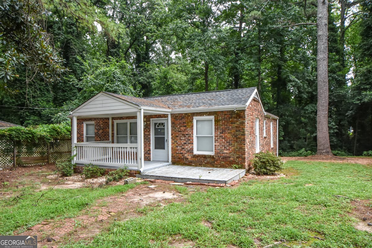 2 bedroom, 1 bathroom, 696 sq ft single family residence for sale at 3274 Fern Drive, Tucker, GA 30084 — photo 1 of 35