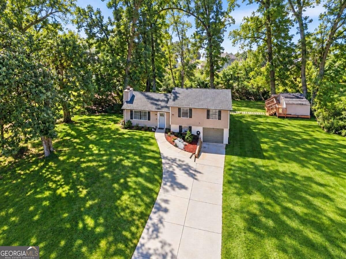 4 bedroom, 3 bathroom, 1,776 sq ft single family residence for sale at 3316 Alcazar Drive, Lilburn, GA 30047 — photo 2