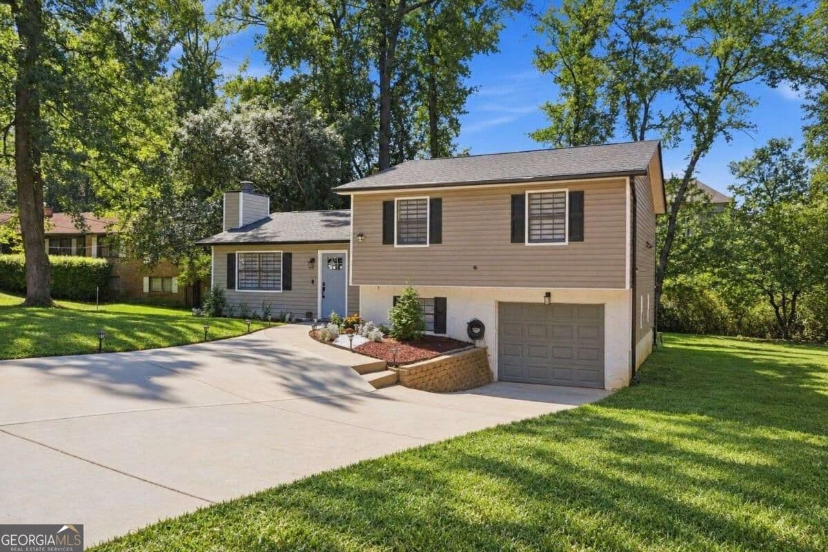 4 bedroom, 3 bathroom, 1,776 sq ft single family residence for sale at 3316 Alcazar Drive, Lilburn, GA 30047 — photo 3