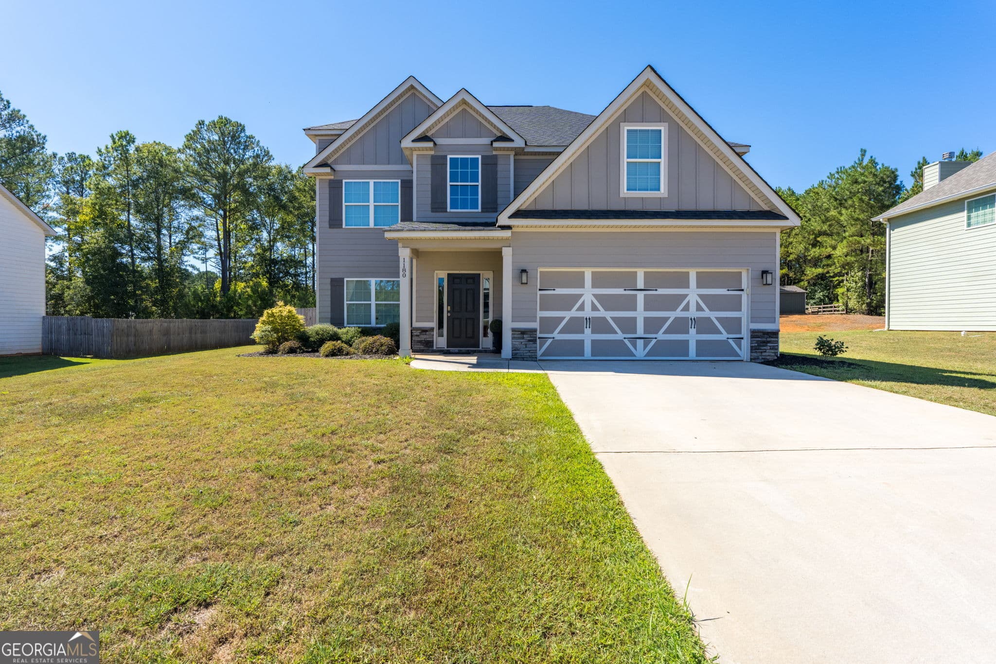 4 bedroom, 2.5 bathroom, 2,347 sq ft single family residence for sale at 1180 Victorian Boulevard, Forsyth, GA 31029 — photo 2