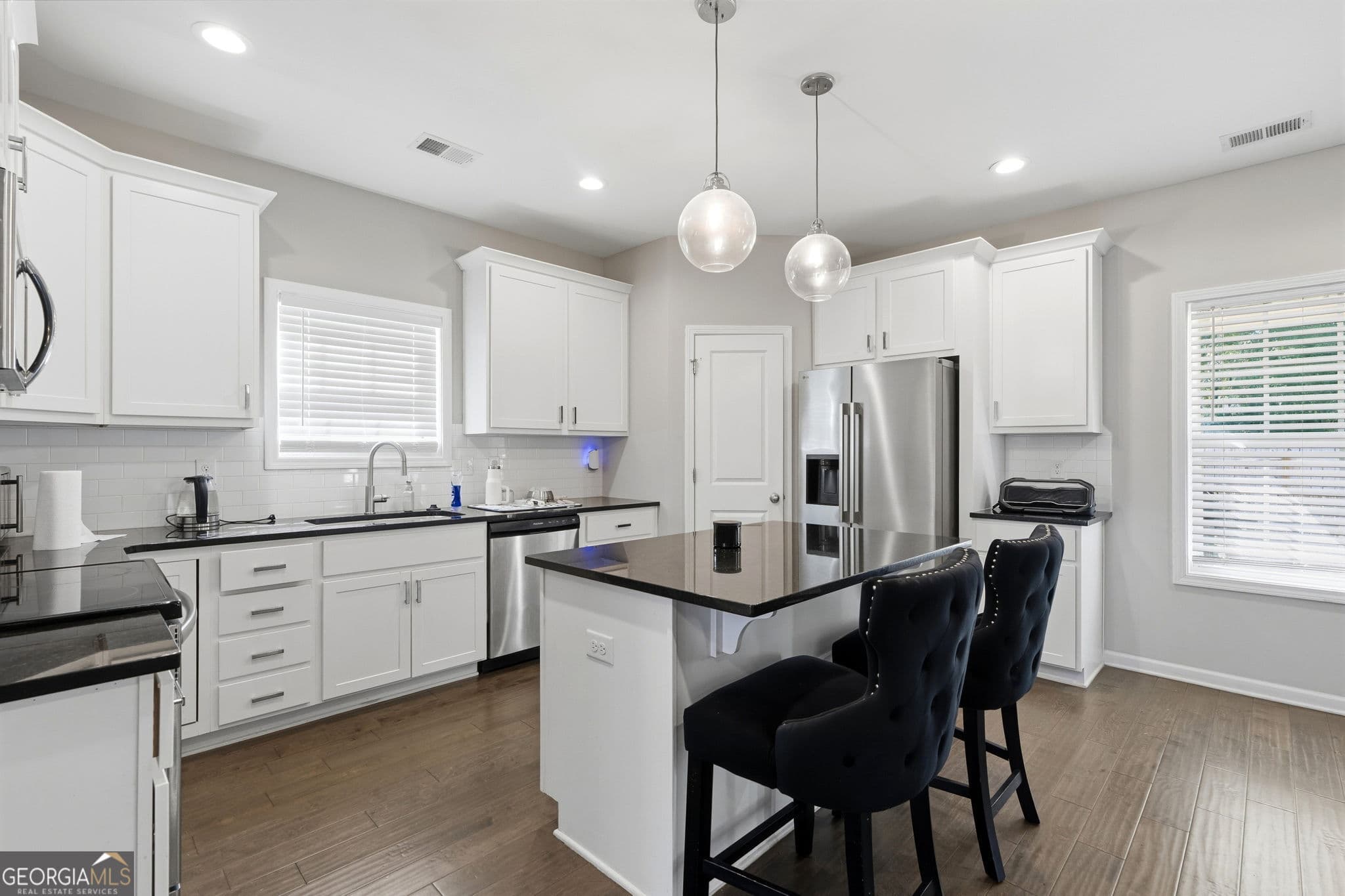 4 bedroom, 2.5 bathroom, 2,347 sq ft single family residence for sale at 1180 Victorian Boulevard, Forsyth, GA 31029 — photo 8