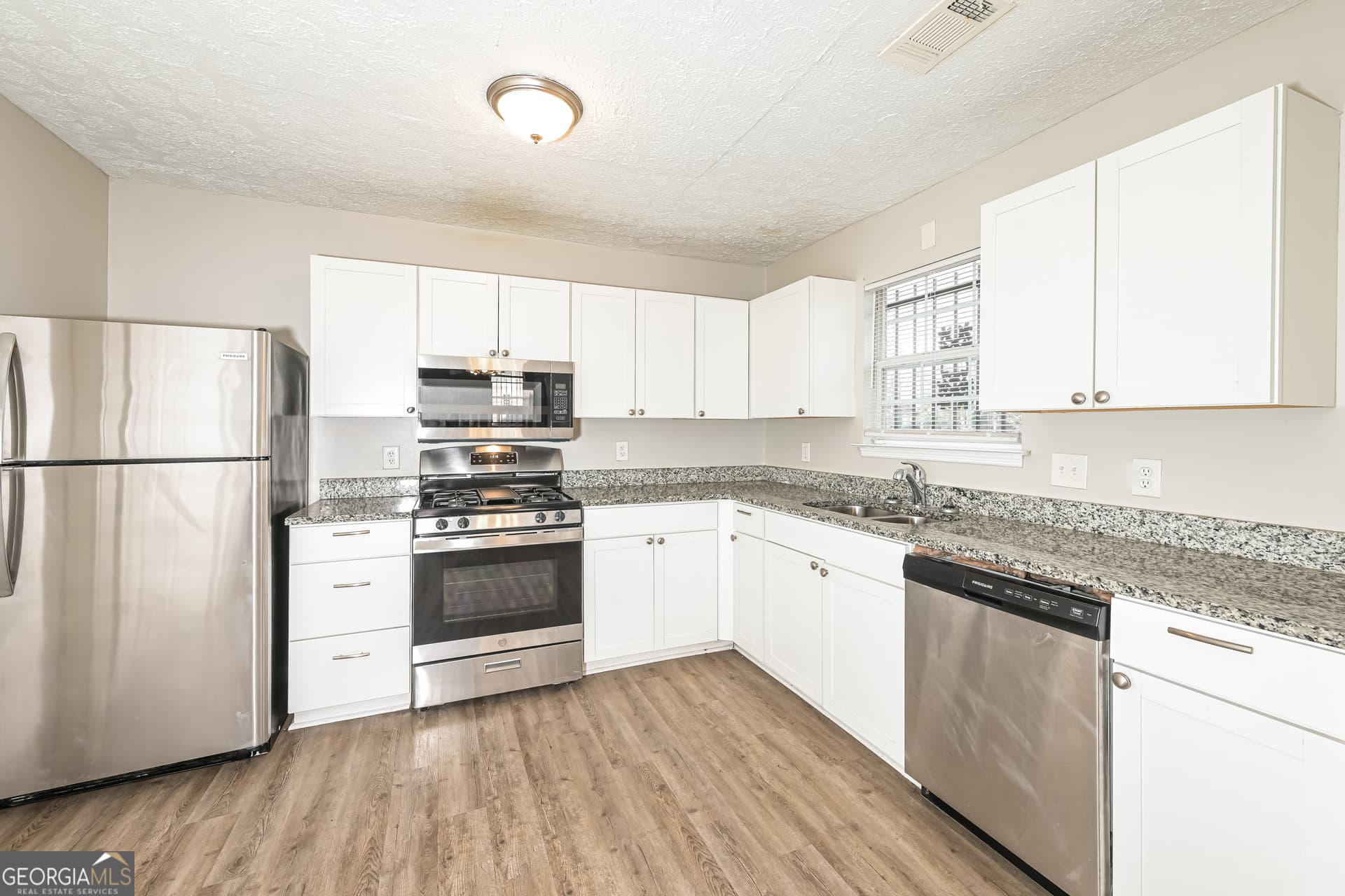 3 bedroom, 2.5 bathroom, 1,400 sq ft single family residence for sale at 1211 To Lani Court, Stone Mountain, GA 30083 — photo 6