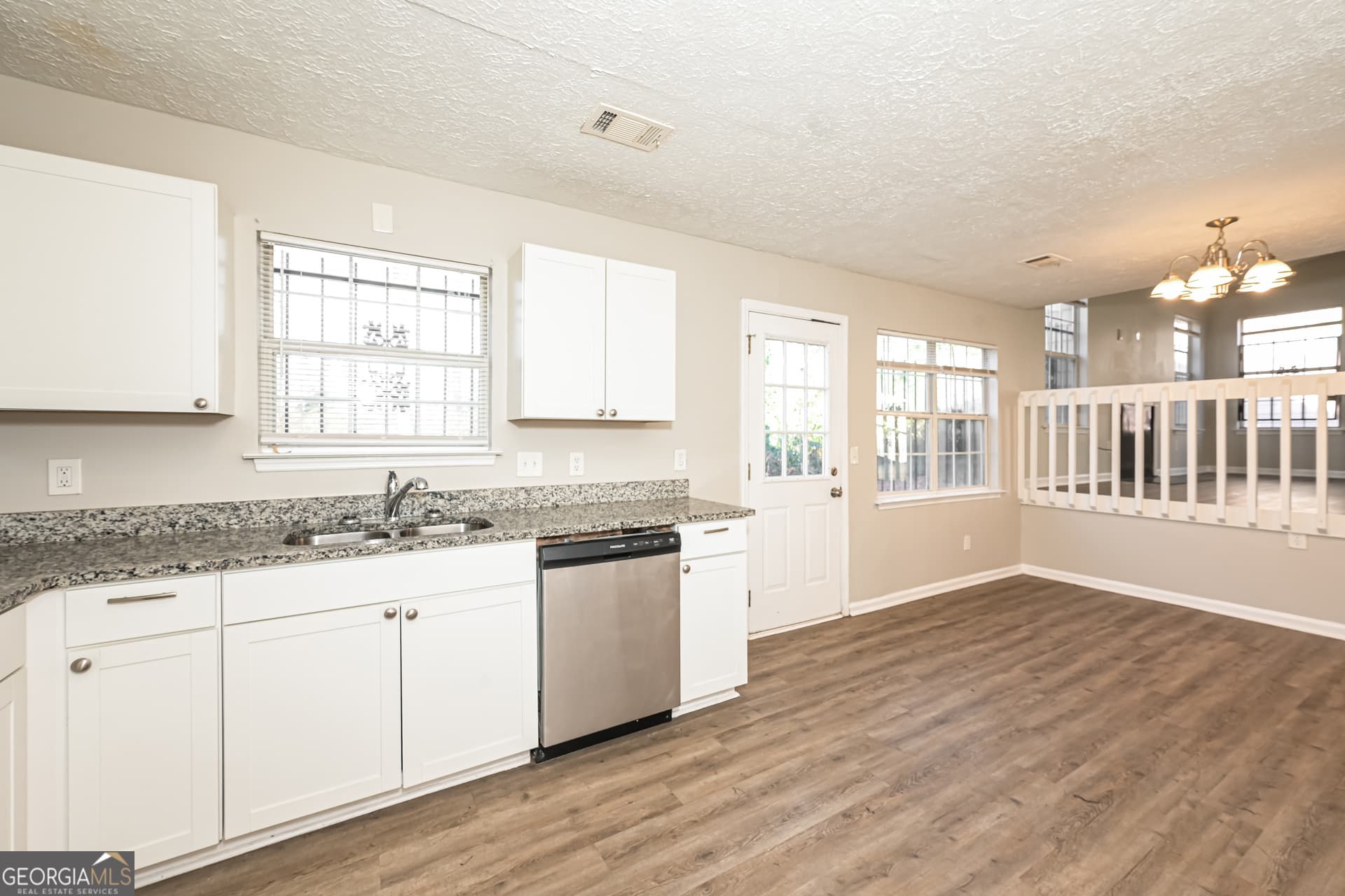 3 bedroom, 2.5 bathroom, 1,400 sq ft single family residence for sale at 1211 To Lani Court, Stone Mountain, GA 30083 — photo 7