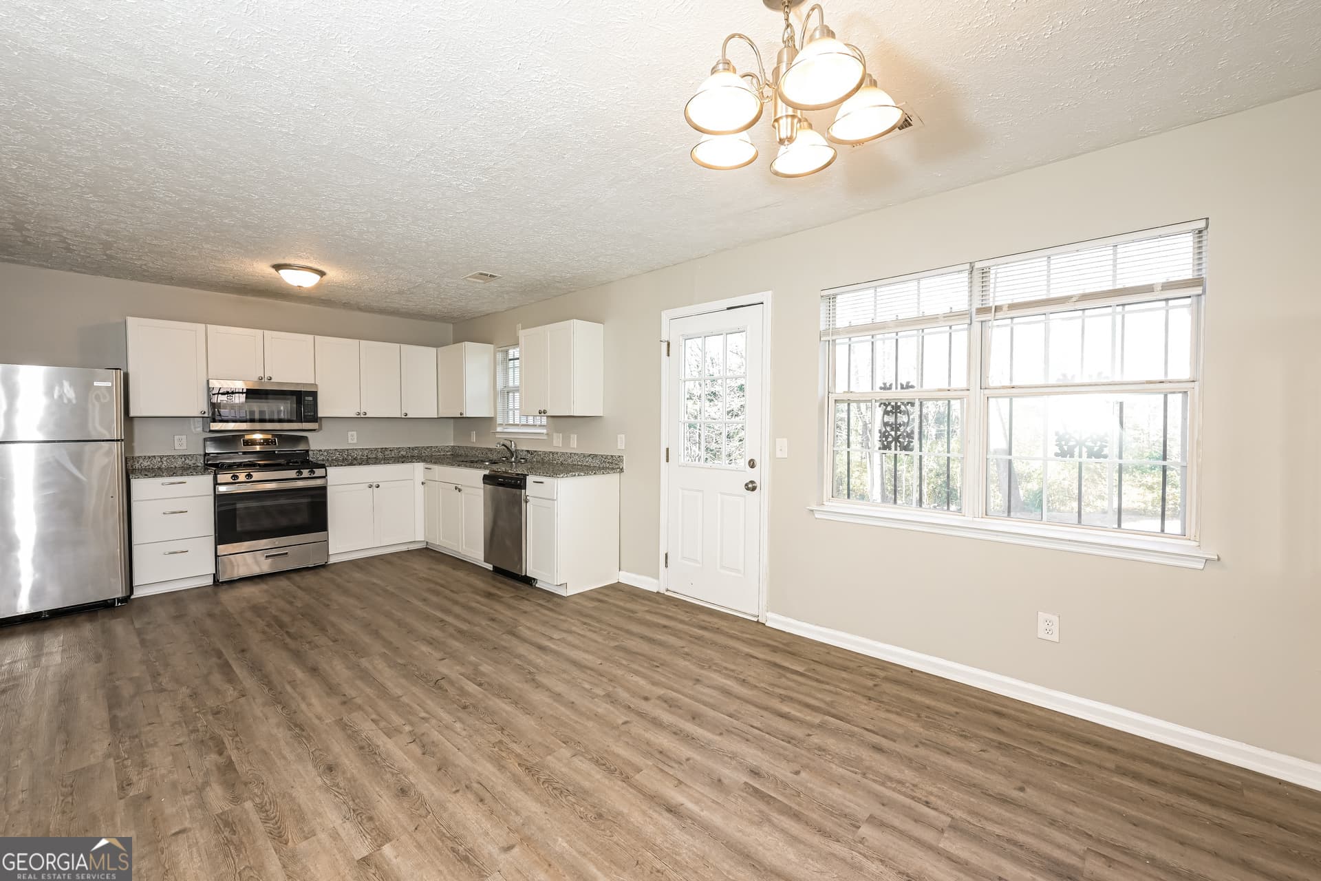 3 bedroom, 2.5 bathroom, 1,400 sq ft single family residence for sale at 1211 To Lani Court, Stone Mountain, GA 30083 — photo 5