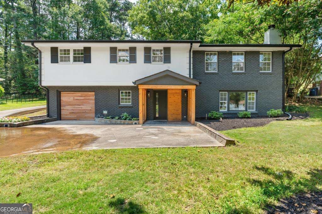 4 bedroom, 2.5 bathroom, 3,108 sq ft single family residence for sale at 2938 Heather Drive, Atlanta, GA 30344 — photo 2