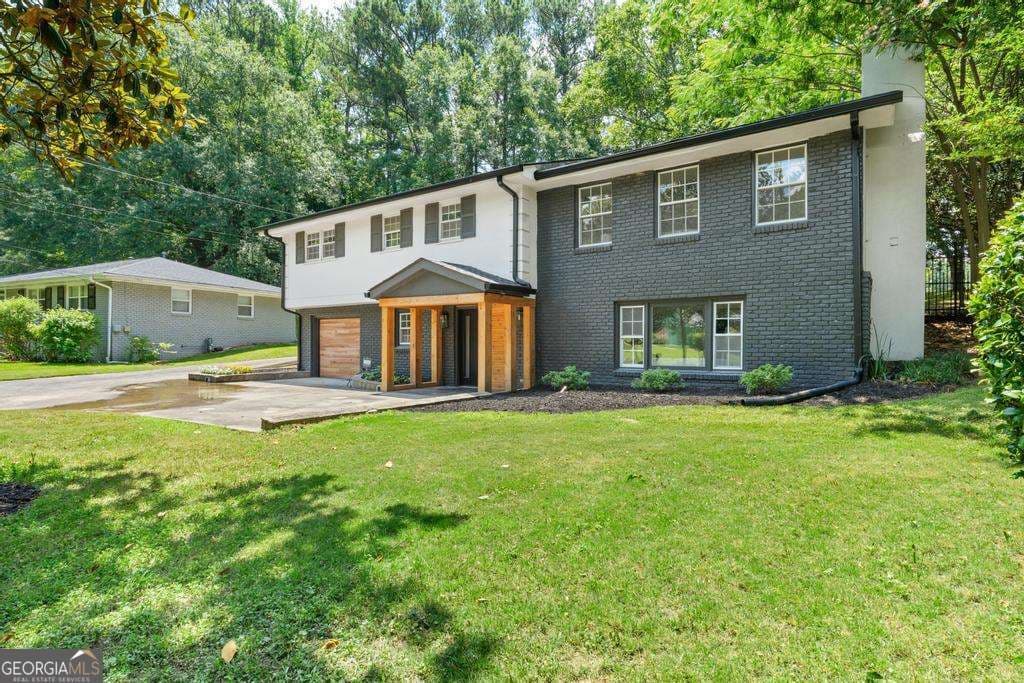 4 bedroom, 2.5 bathroom, 3,108 sq ft single family residence for sale at 2938 Heather Drive, Atlanta, GA 30344 — photo 4