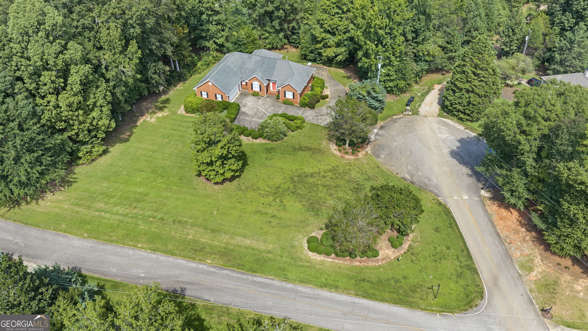 4 bedroom, 3 bathroom, 4,660 sq ft single family residence for sale at 127 Agape Street, Williamson, GA 30292 — photo 2