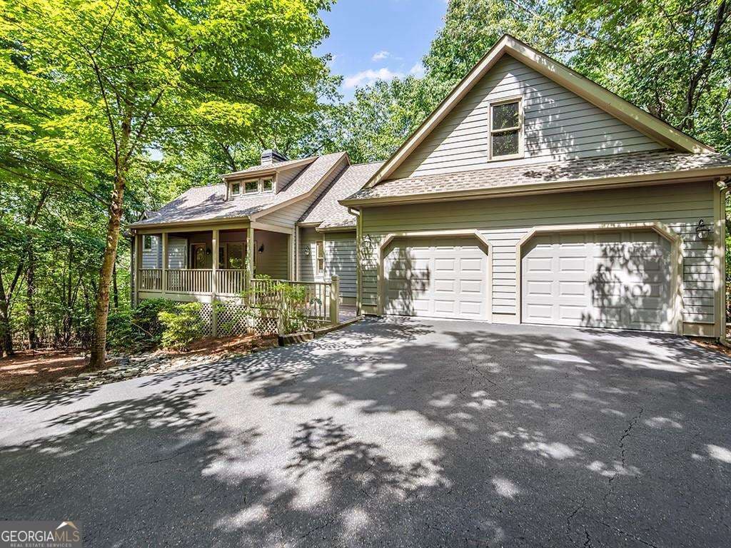 3 bedroom, 3.5 bathroom, 2,922 sq ft single family residence for sale at 158 Canacaught Place, Big Canoe, GA 30143 — photo 1 of 39