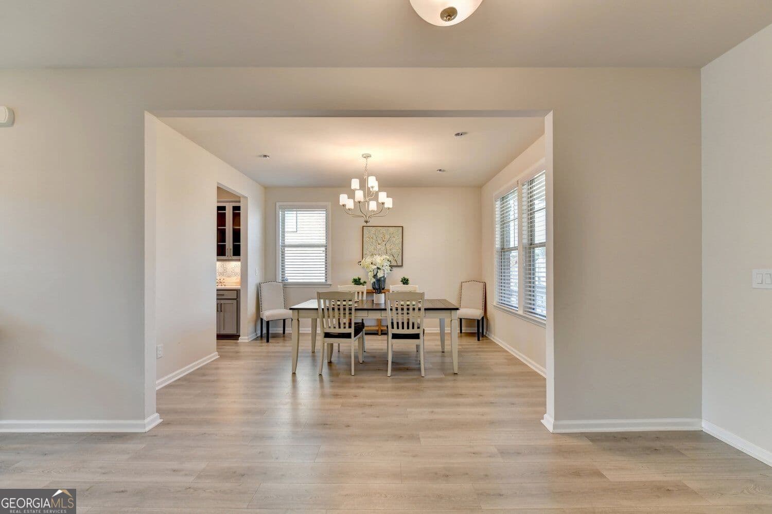 5 bedroom, 4.5 bathroom, 3,756 sq ft single family residence for sale at 8680 Shipton Circle, Ball Ground, GA 30107 — photo 6