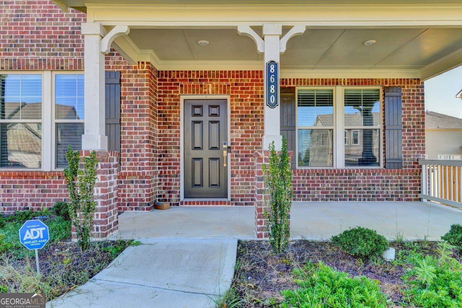 5 bedroom, 4.5 bathroom, 3,756 sq ft single family residence for sale at 8680 Shipton Circle, Ball Ground, GA 30107 — photo 4