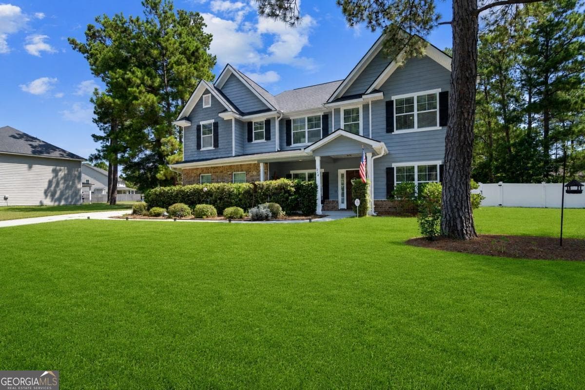 5 bedroom, 4 bathroom, 3,466 sq ft single family residence for sale at 214 Cypress Lakes Drive, Bloomingdale, GA 31302 — photo 2