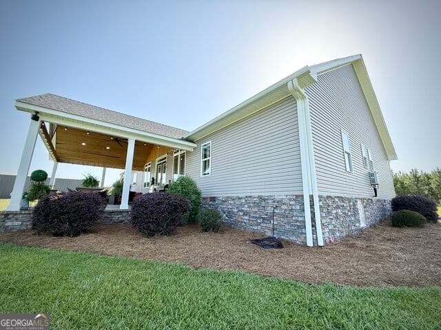 4 bedroom, 3.5 bathroom, 3,237 sq ft single family residence for sale at 2493 Broxton Highway, Denton, GA 31532 — photo 6