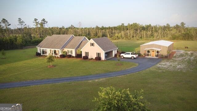 4 bedroom, 3.5 bathroom, 3,237 sq ft single family residence for sale at 2493 Broxton Highway, Denton, GA 31532