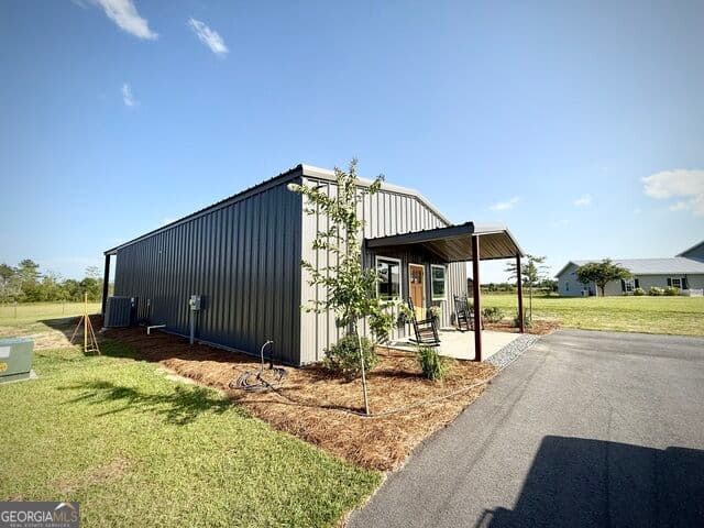 4 bedroom, 3.5 bathroom, 3,237 sq ft single family residence for sale at 2493 Broxton Highway, Denton, GA 31532 — photo 9