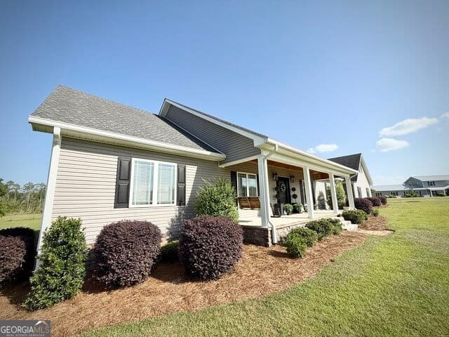 4 bedroom, 3.5 bathroom, 3,237 sq ft single family residence for sale at 2493 Broxton Highway, Denton, GA 31532 — photo 8