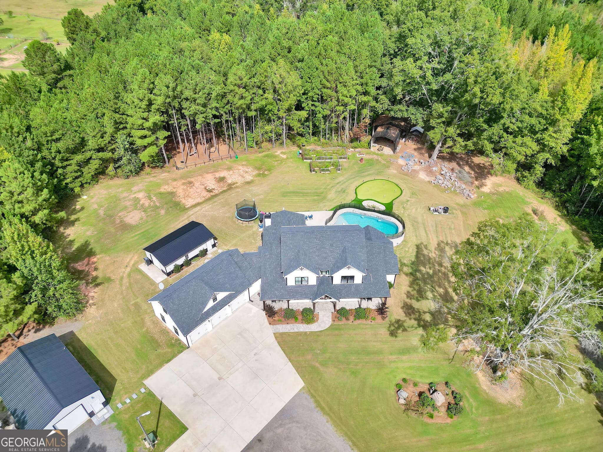 6 bedroom, 5.5 bathroom, 3,602 sq ft single family residence for sale at 2901 Teamon Road, Griffin, GA 30223 — photo 7