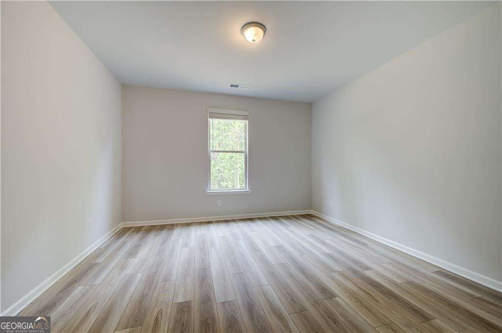 5 bedroom, 4 bathroom single family residence for sale at 145 Haverling Pass, Hampton, GA 30228 — photo 6