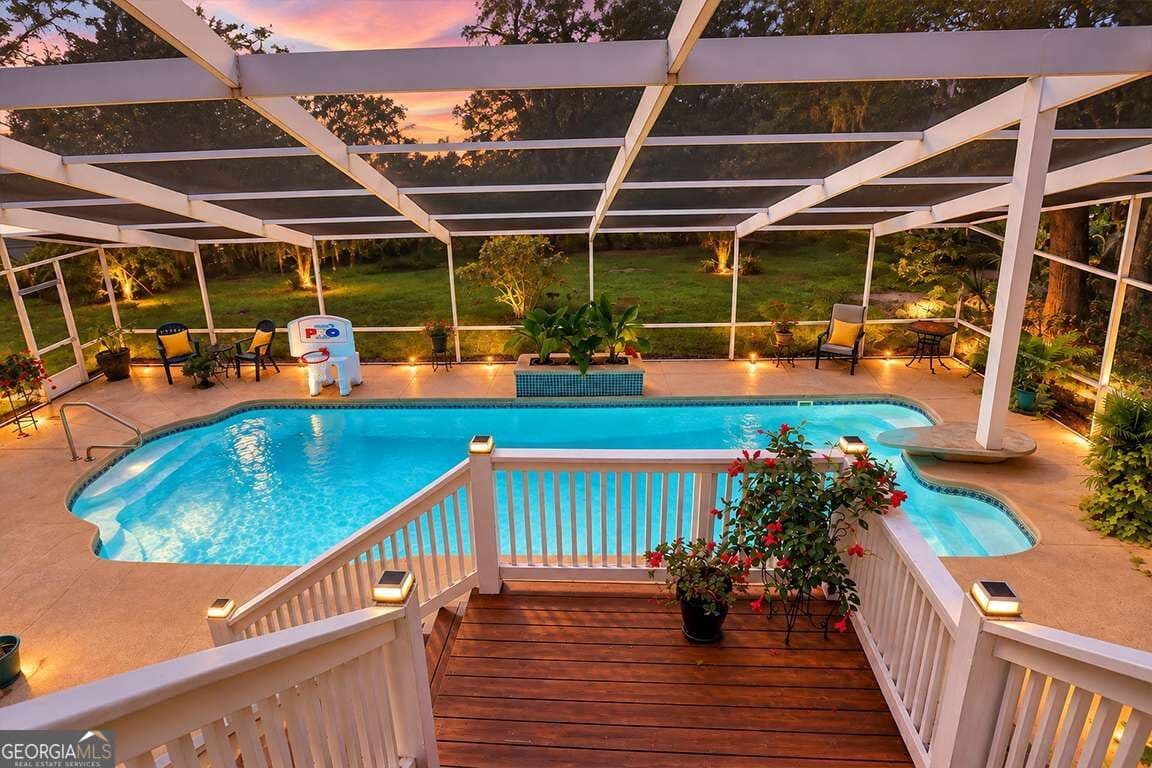 6 bedroom, 4 bathroom, 5,040 sq ft single family residence for sale at 634 Mill Run Road, Richmond Hill, GA 31324 — photo 2