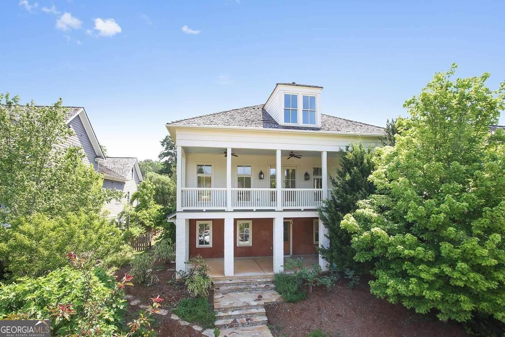 5 bedroom, 4.5 bathroom, 5,744 sq ft single family residence for sale at 10555 Serenbe Lane, Palmetto, GA 30268