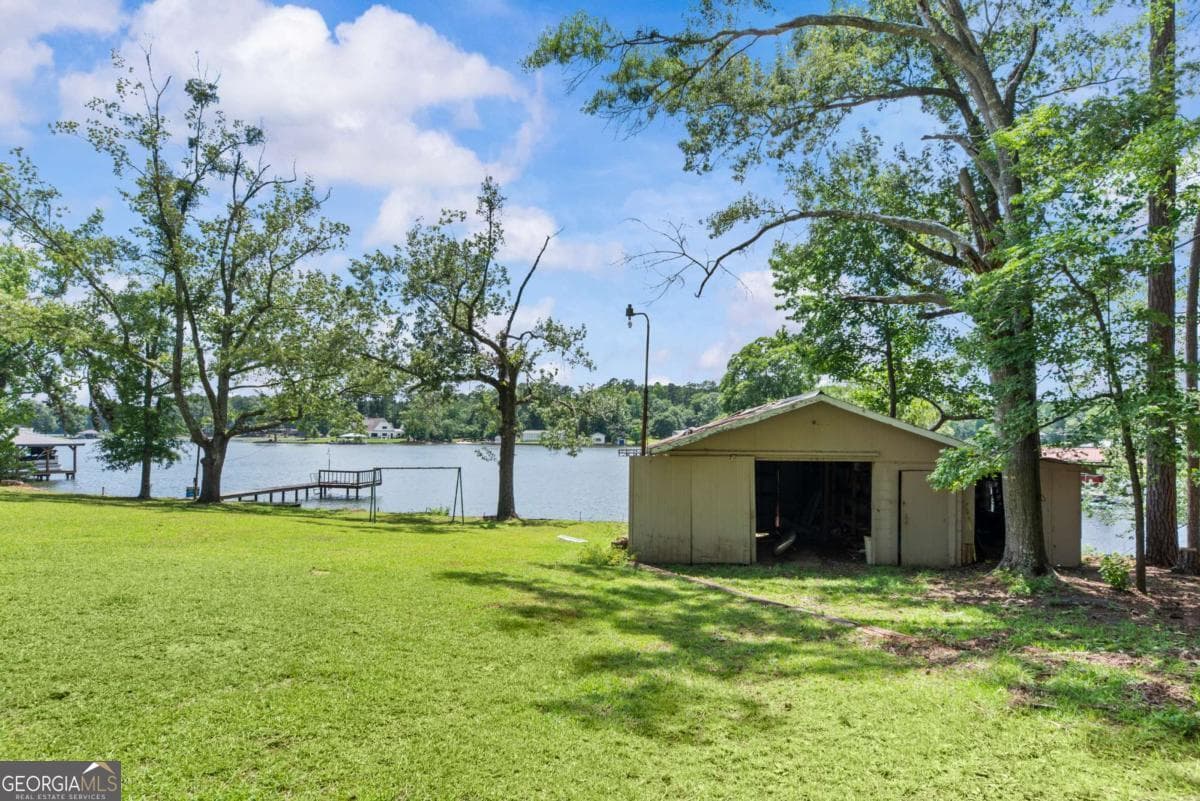 4 bedroom, 3 bathroom, 4,938 sq ft single family residence for sale at 144 Sinclair Circle, Eatonton, GA 31024 — photo 3