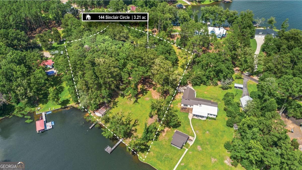 4 bedroom, 3 bathroom, 4,938 sq ft single family residence for sale at 144 Sinclair Circle, Eatonton, GA 31024