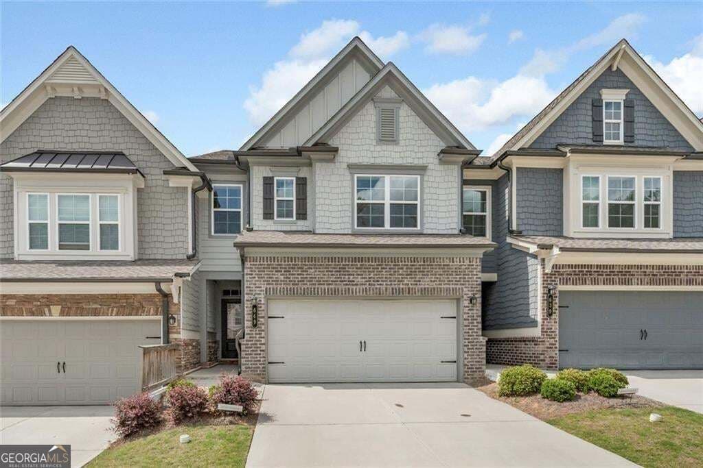 3 bedroom, 2.5 bathroom, 1,934 sq ft townhouse for sale at 649 Isom Walk, Suwanee, GA 30024 — photo 1 of 65