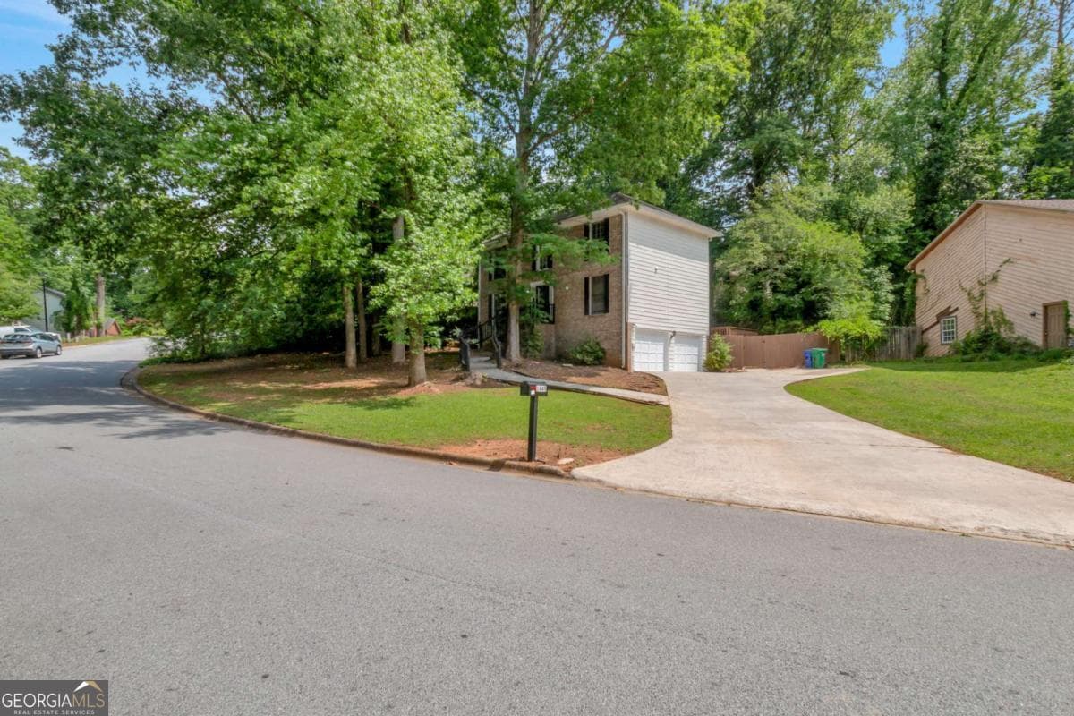 4 bedroom, 2.5 bathroom, 2,100 sq ft single family residence sold at 1449 Golf Link Drive, Stone Mountain, GA 30088