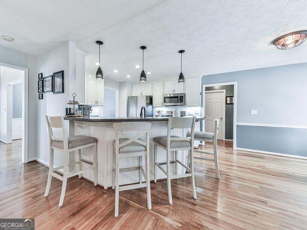 5 bedroom, 4 bathroom, 2,864 sq ft single family residence for sale at 373 Yonah Circle, Woodstock, GA 30189 — photo 10