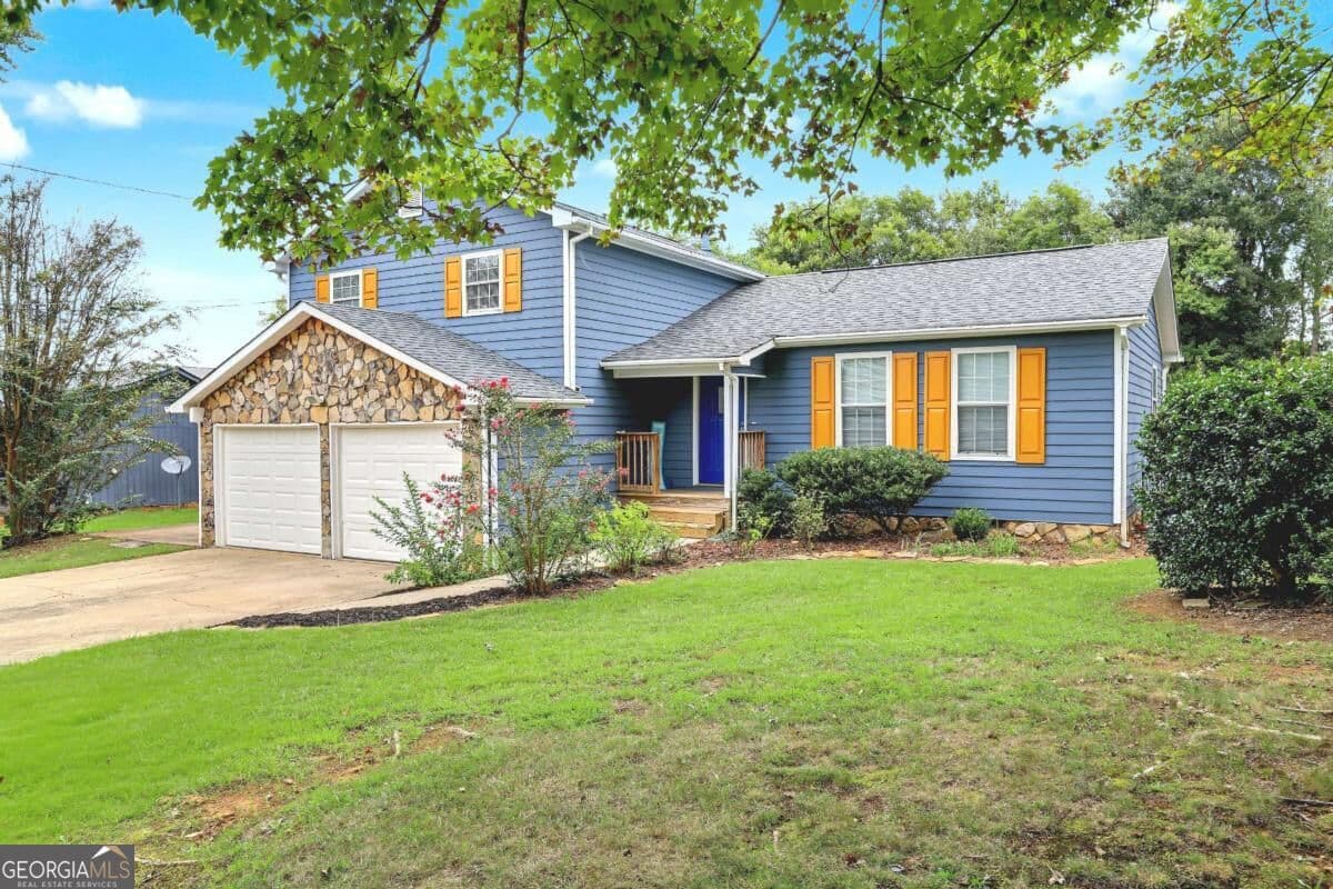 3 bedroom, 2 bathroom, 1,304 sq ft single family residence for sale at 3447 Trickum Road, Woodstock, GA 30188 — photo 3
