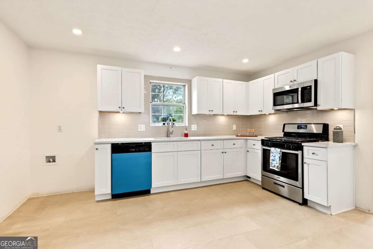 3 bedroom, 2 bathroom, 1,304 sq ft single family residence for sale at 3447 Trickum Road, Woodstock, GA 30188 — photo 9