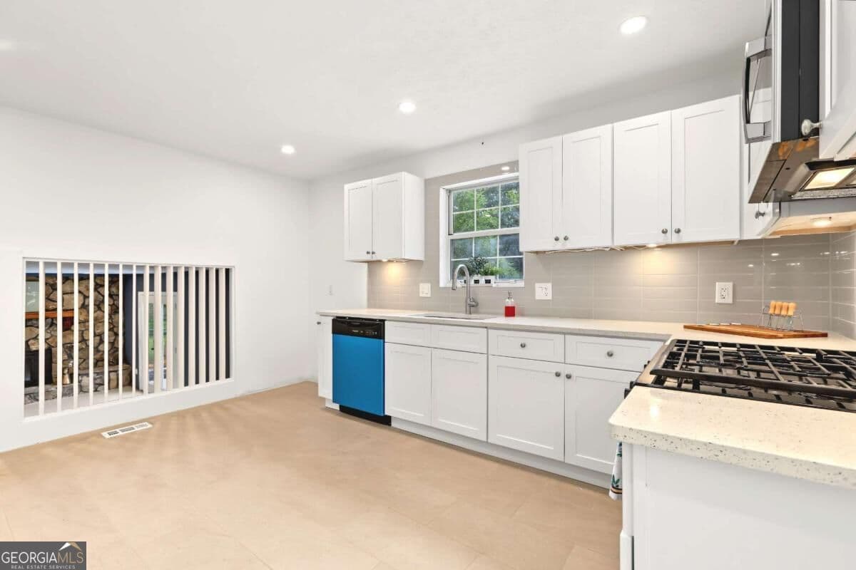 3 bedroom, 2 bathroom, 1,304 sq ft single family residence for sale at 3447 Trickum Road, Woodstock, GA 30188 — photo 10