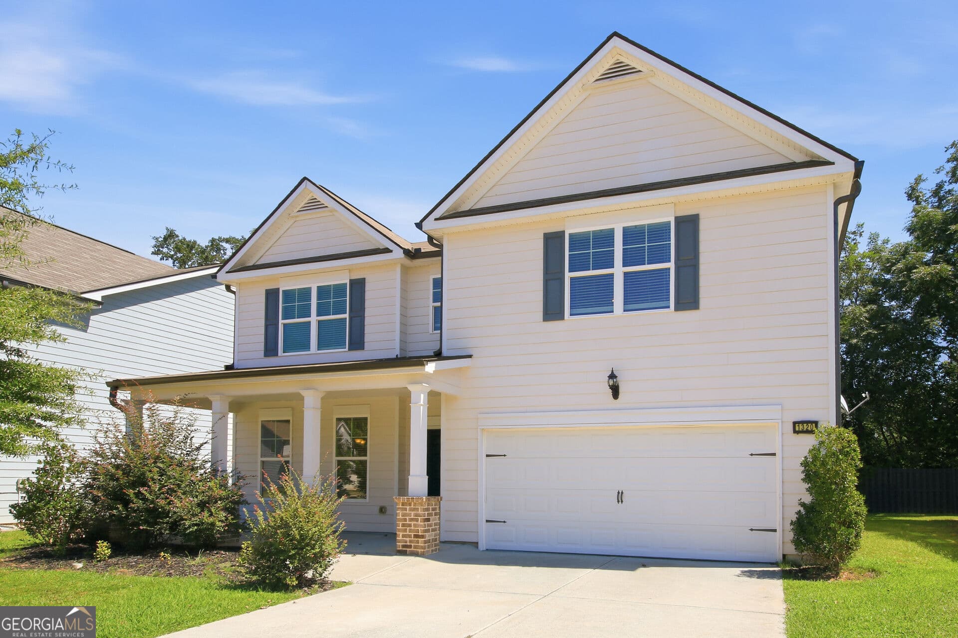 4 bedroom, 2.5 bathroom, 2,371 sq ft single family residence for sale at 1320 Grove Park Lane, Jonesboro, GA 30236 — photo 2
