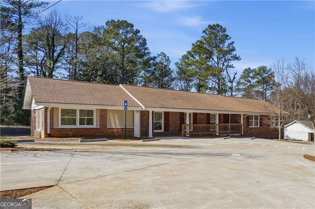 4 bedroom, 2 bathroom, 2,200 sq ft single family residence for sale at 2239 Scenic Drive, Snellville, GA 30078 — photo 2